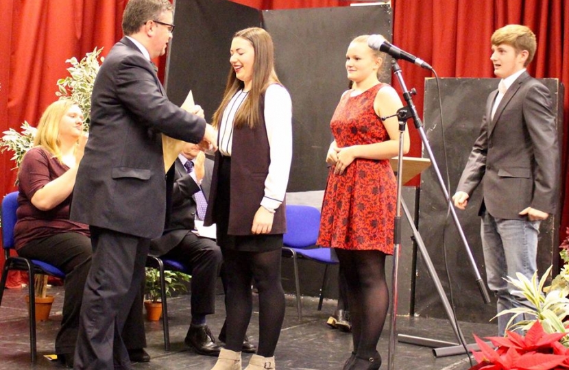 Robert Buckland MP presenting certificates to Dorcan Academy students