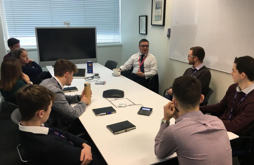 Robert Buckland MP pictured with apprentices at Nationwide in Swindon