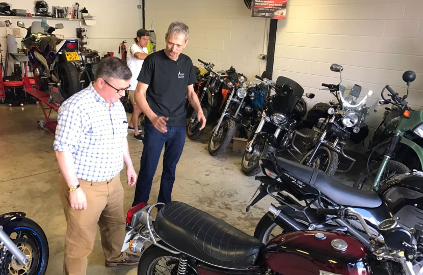 Robert Buckland MP and Ash from Ash's Autos in Swindon