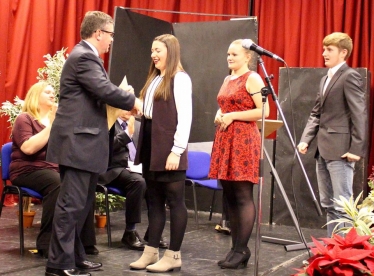 Robert Buckland MP presenting certificates to Dorcan Academy students