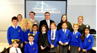 Solicitor General Robert Buckland visits children at Adel Primary School in Leeds