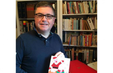 Robert with last year's winning card